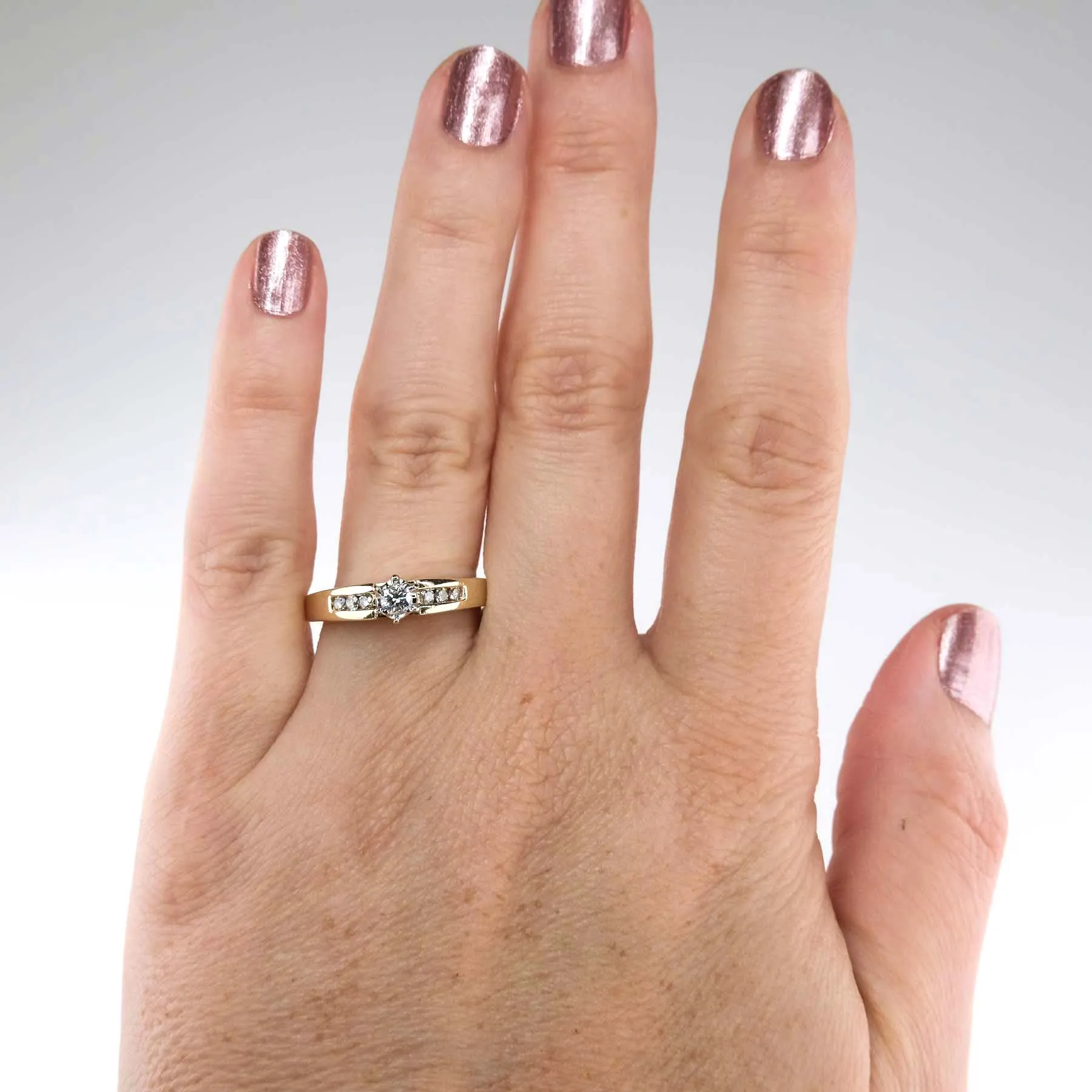 0.20ctw Round Diamond w/ Side Accented Engagement Ring in 14K Yellow Gold