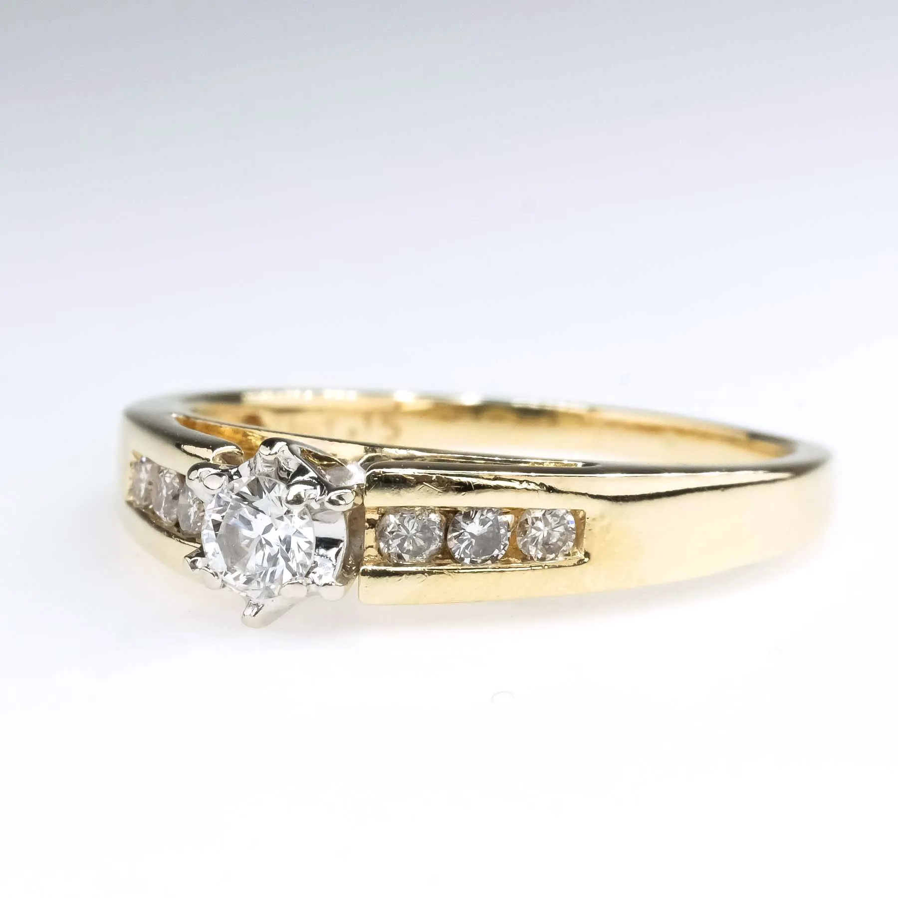 0.20ctw Round Diamond w/ Side Accented Engagement Ring in 14K Yellow Gold